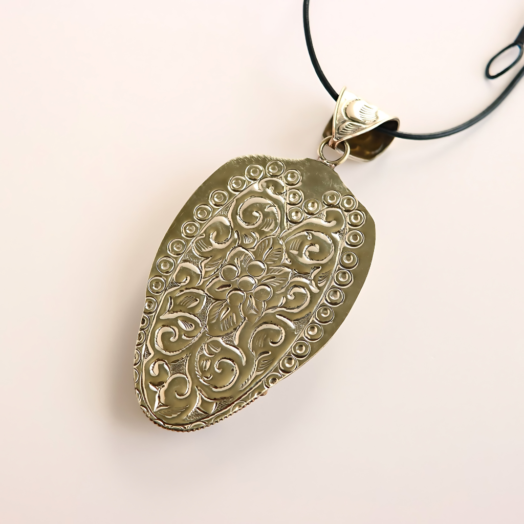 Decorative silver wolf necklace pendant on a white background