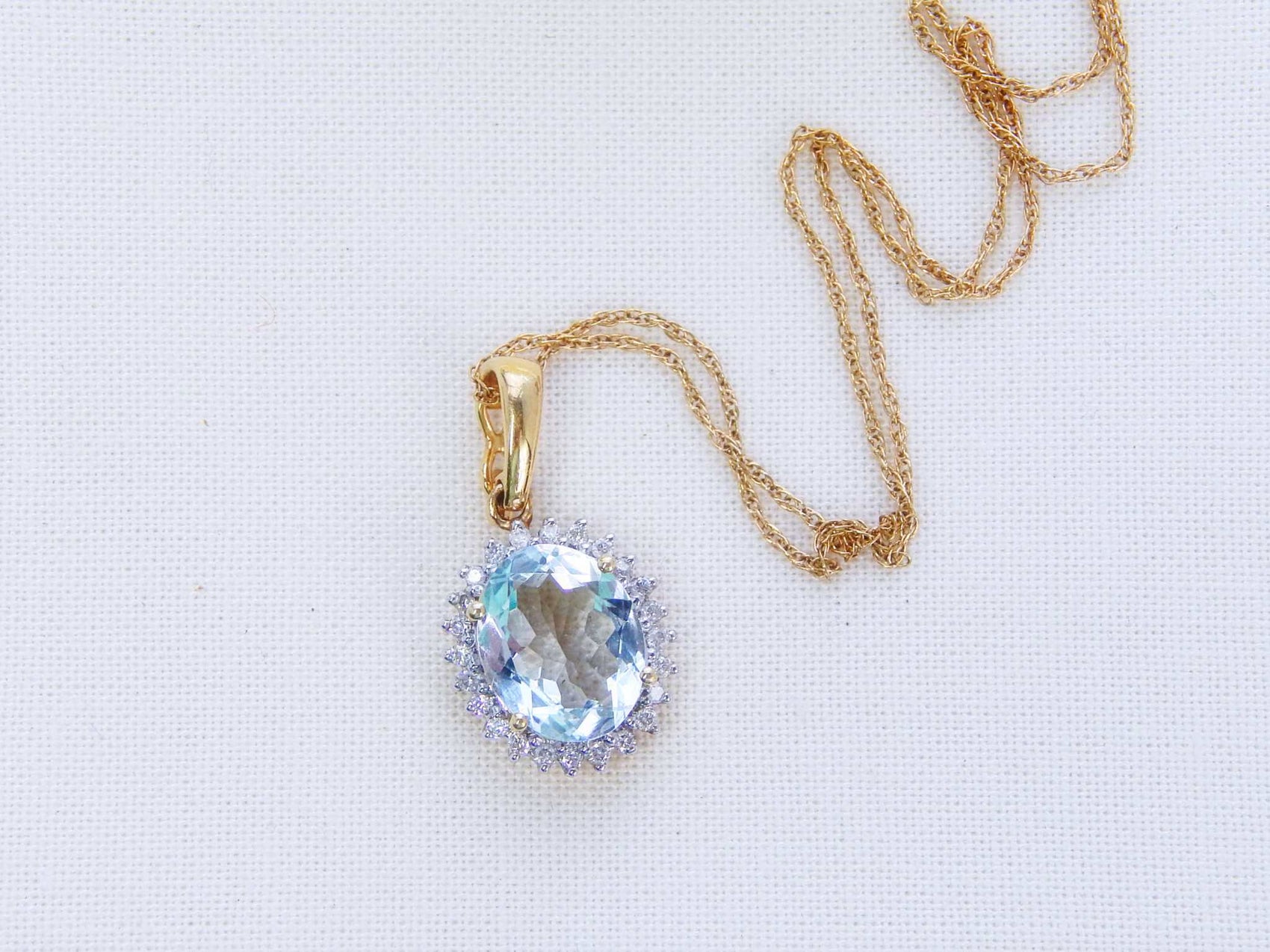 14K Yellow Gold Aquamarine Pendant Necklace in Diamond Halo