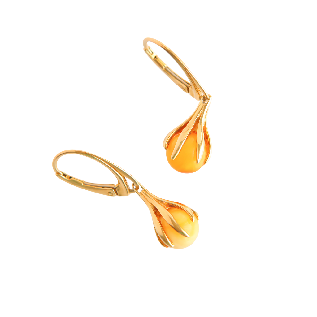 Gold Amber Earrings Baltic amber claw dangle earrings in 14k gold-plated sterling silver, showcasing butterscotch amber.
