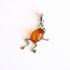 A frog pendant necklace featuring a polished amber-colored oval body and silver-toned metal limbs and bail, photographed on a plain white background.