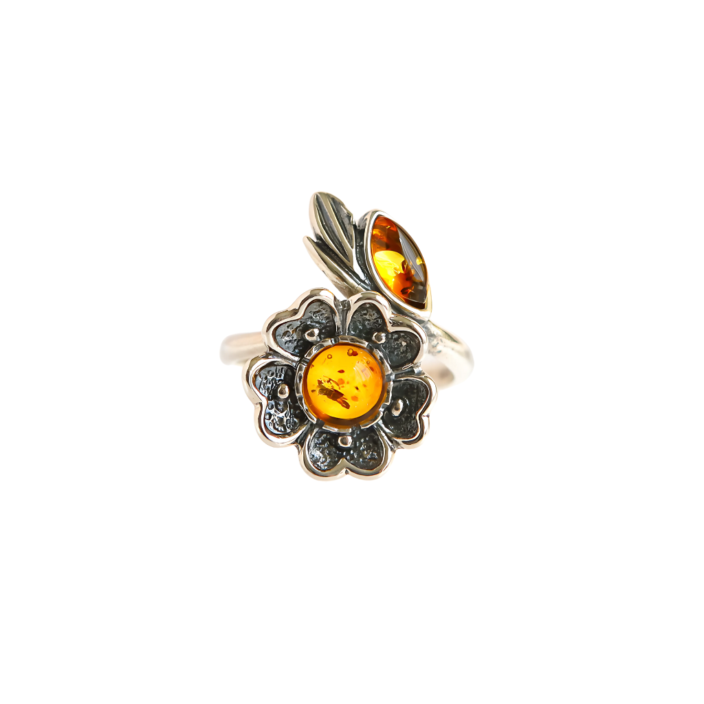 Natural Baltic cognac amber adjustable flower ring in tarnished 925 sterling silver.