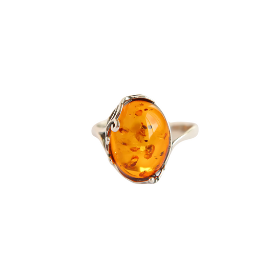 Baltic amber ring in 925 sterling silver with Victorian design featuring oval cognac amber stone.