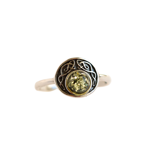 Baltic green amber ring in 925 sterling silver with intricate designs.