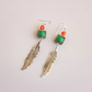 feather drop earrings with green and orange gemstones