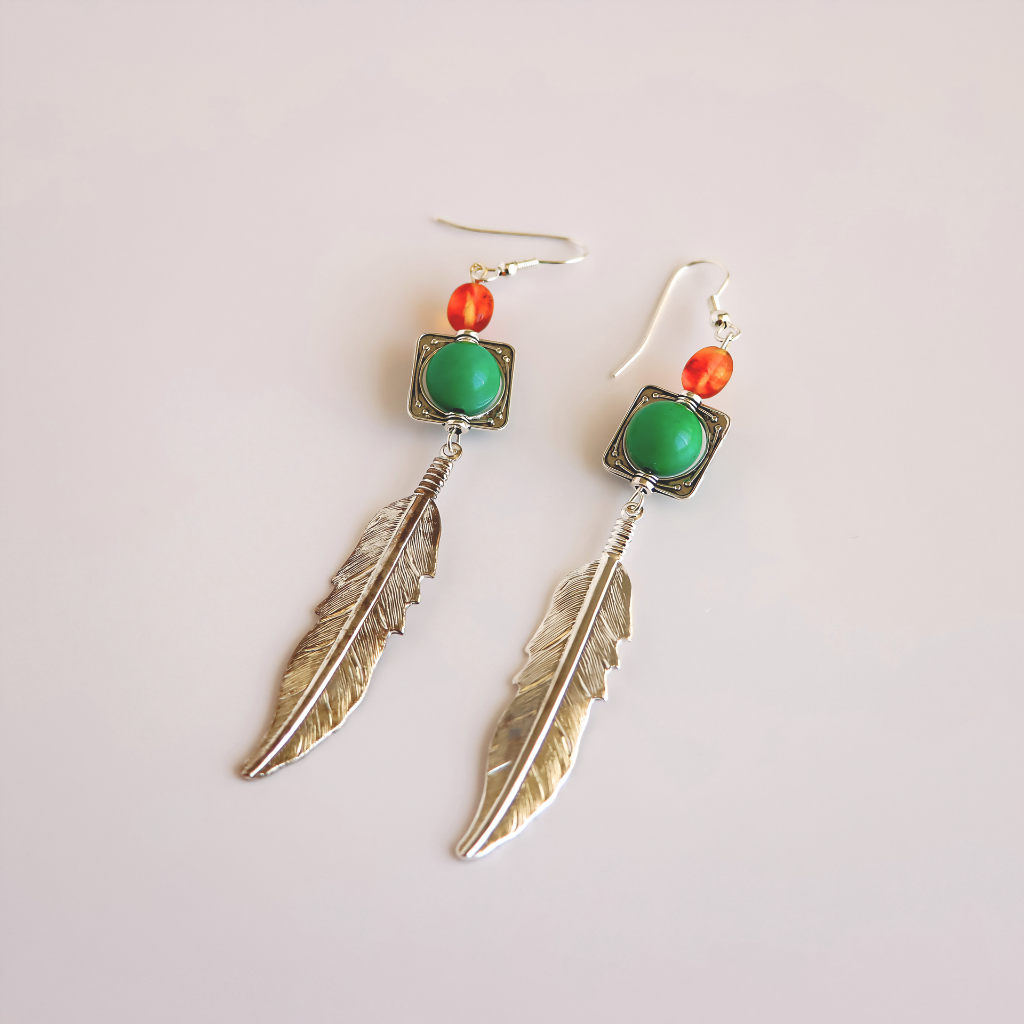 feather drop earrings with green and orange gemstones