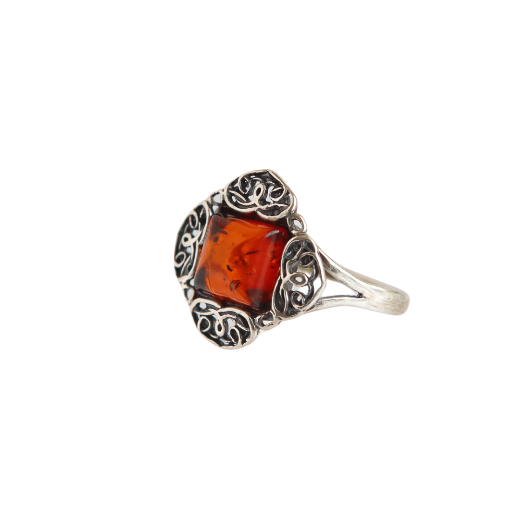 Baltic Cherry Amber Celtic Ring in 925 Sterling Silver with cushion cut gemstone.