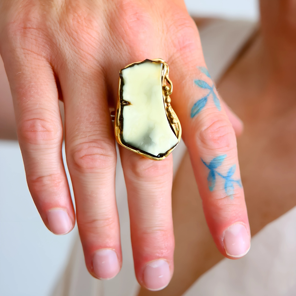 Close-up of Baltic amber statement ring in 14k gold plated sterling silver showing unique details