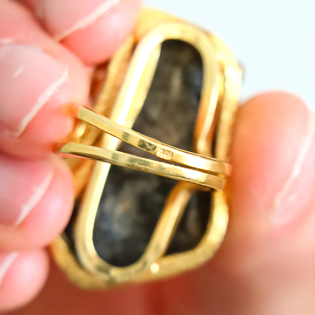 Side angle of Baltic amber statement ring highlighting 925 sterling silver stamp