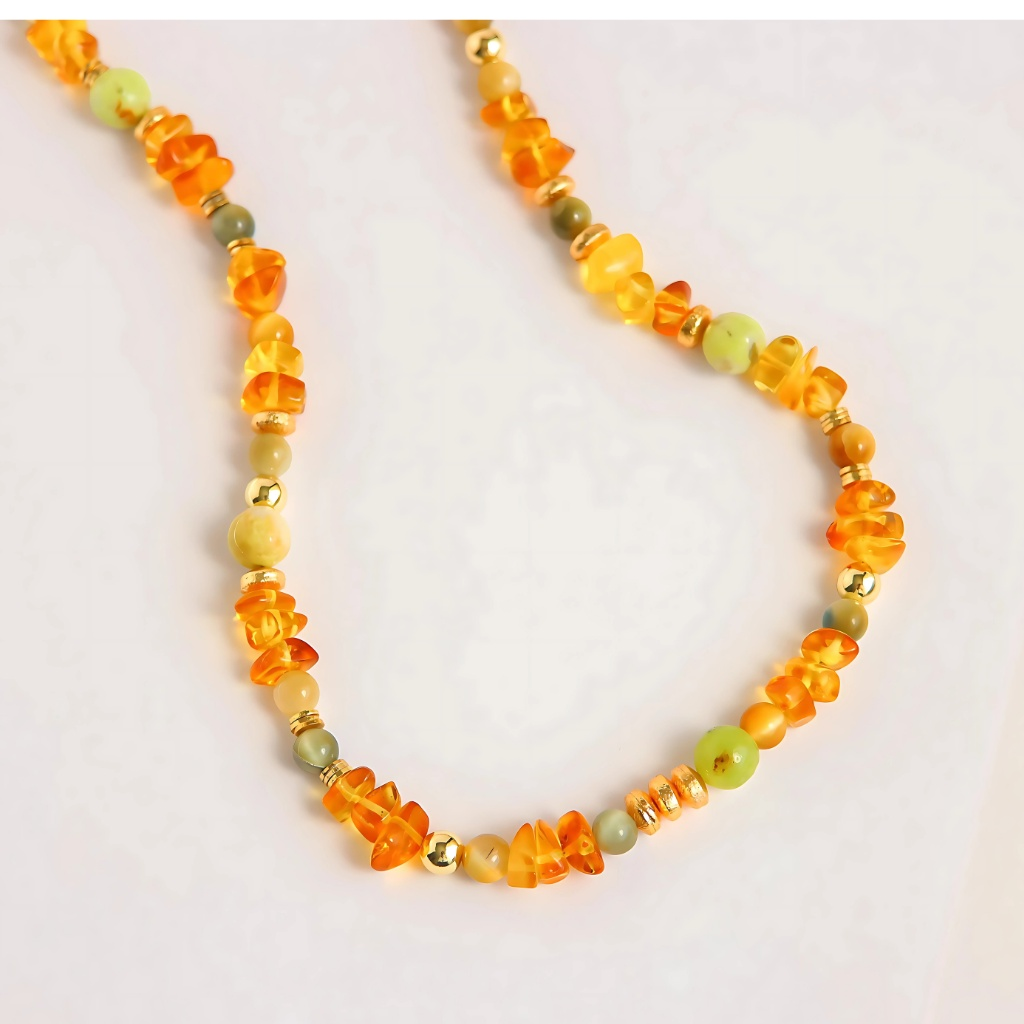 Handmade Baltic lemon amber necklace with green opal and gold tiger's eye accents.
