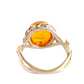 Baltic Cognac Amber ring in sterling silver with delicate silver flower accents.