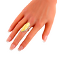 Natural Baltic lemon amber marquise cut sterling silver statement ring on hand.