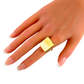 White amber square cut ring in 14k gold plated s925, featuring unique colors, displayed on a hand.
