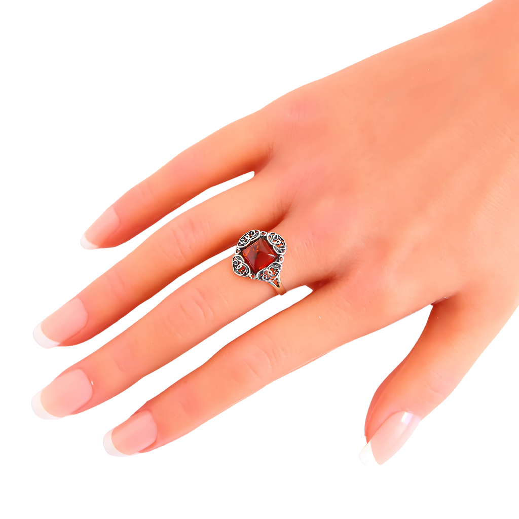 Baltic Cherry Amber Celtic Ring in 925 Sterling Silver on hand.