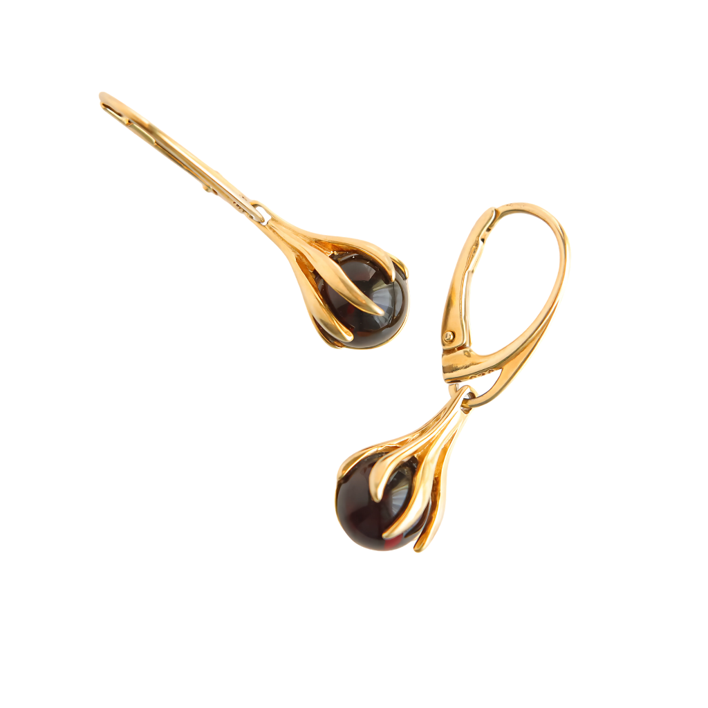 Gold Amber Earrings Baltic amber claw earrings in 14k gold-plated S925, featuring unique dangle design with cherry amber stone.