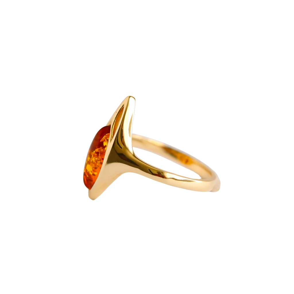 14K gold marquise cut Cognac gold amber ring with polished finish.