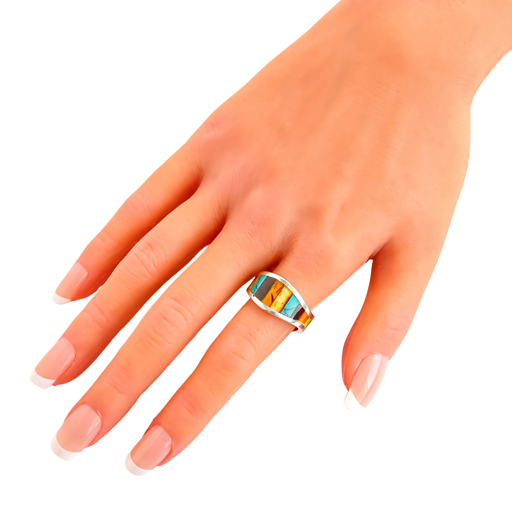 Baltic amber and turquoise ring in sterling silver on hand.