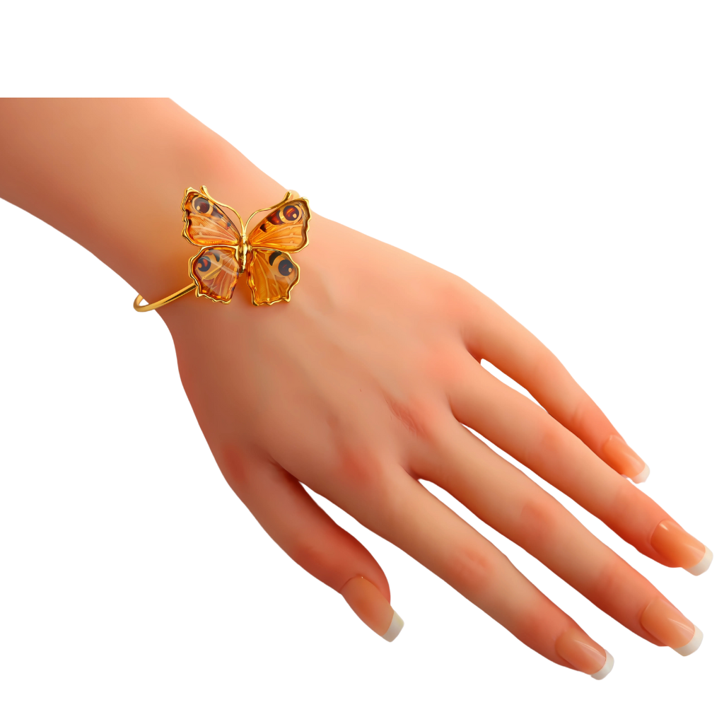 Baltic Amber laser-cut gold butterfly bracelet in 14k gold plated s925 sterling silver on wrist.