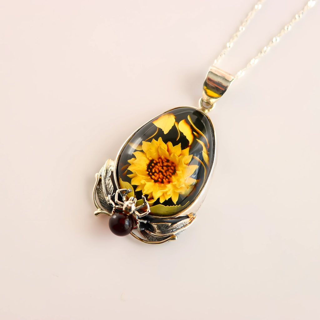amber Necklace with a sunflower pendant on a light background