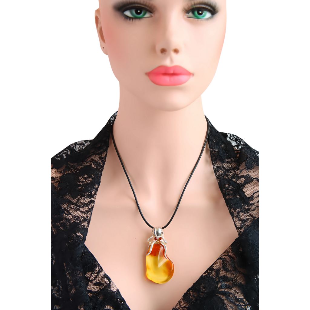 Baltic Amber Octopus Pendant Necklace in Sterling Silver with Ombre Coloring on Leather Cord.