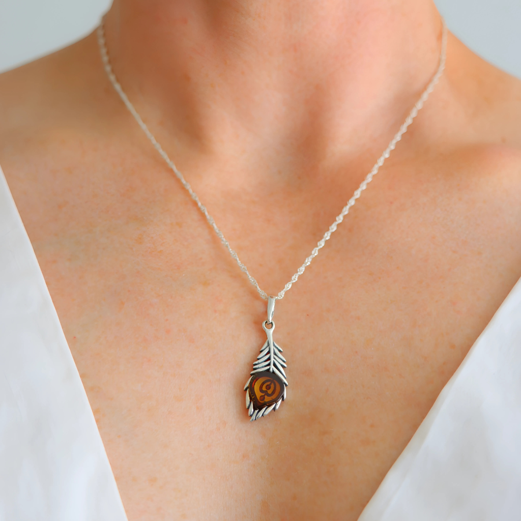 Silver feather amber necklace front view