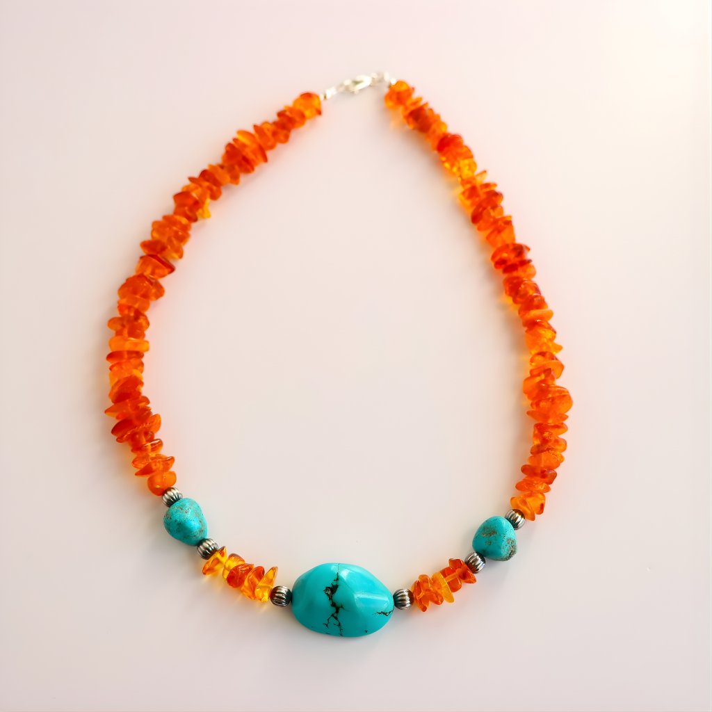 beaded Necklace with orange beads and turquoise stones on a light background