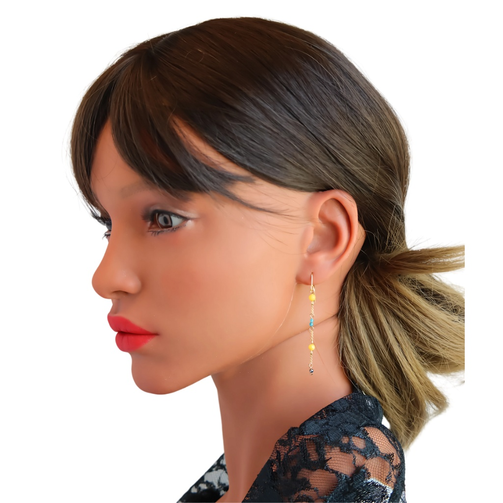Baltic butterscotch amber earrings in 14k gold plated S925 on model.