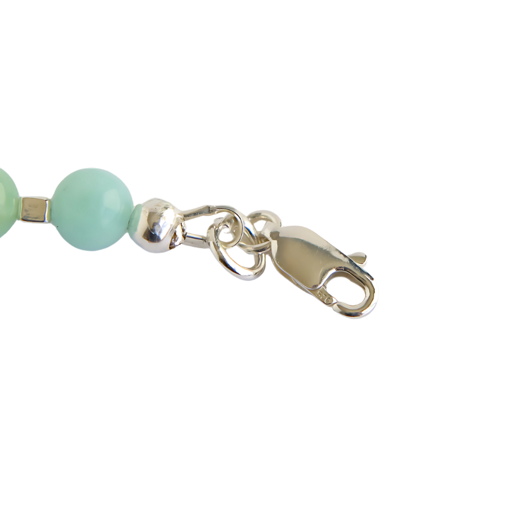 Sterling silver lobster claw closure on a Baltic Lemon Amber and Burma Jade statement necklace.