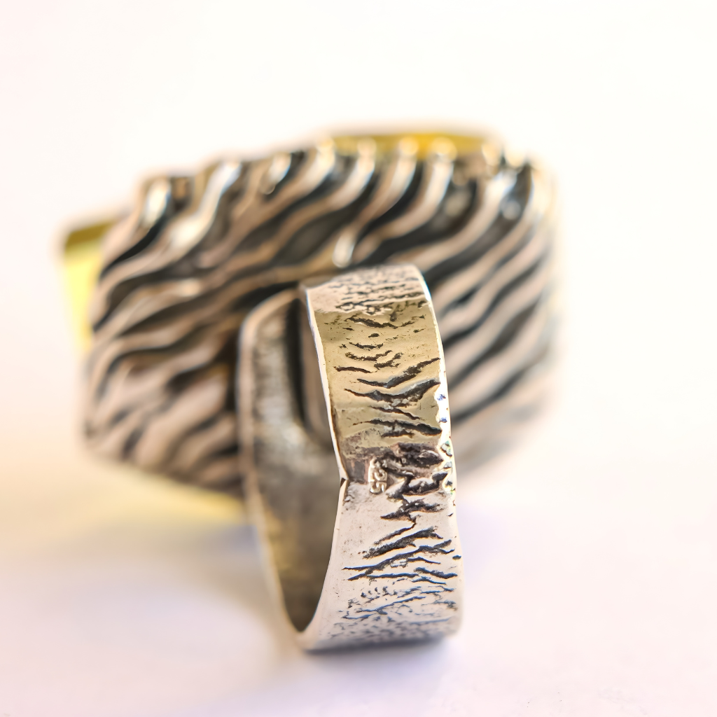 amber ring on a white background