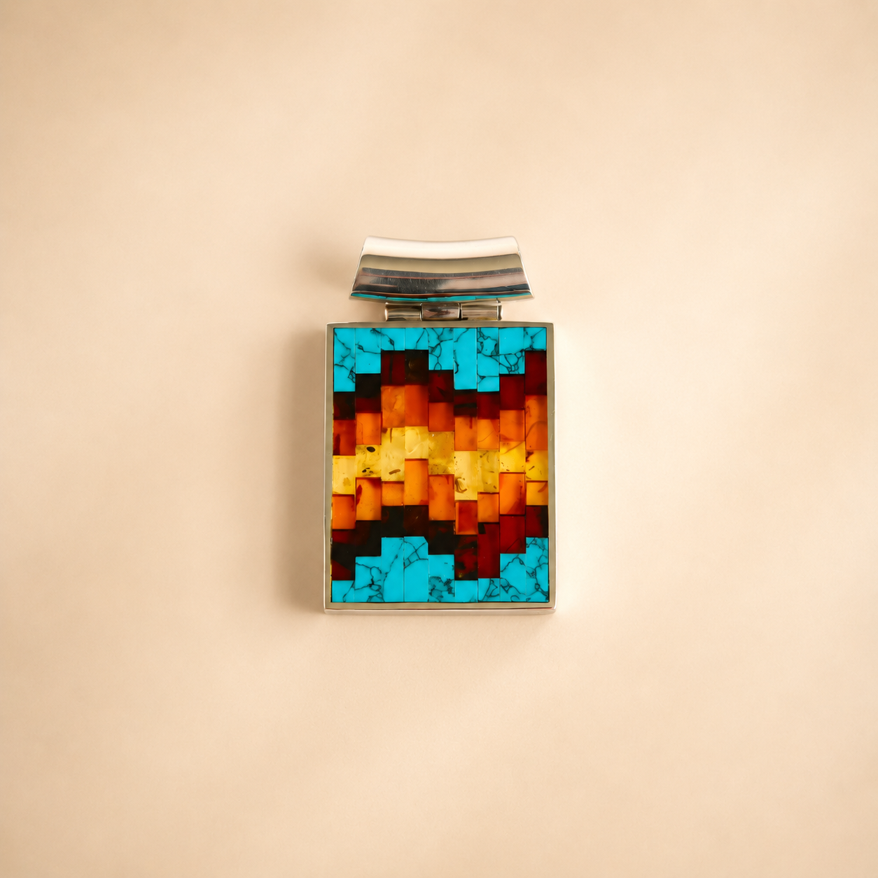 Colorful geometric turquoise necklace on a beige background