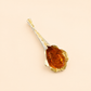 amber necklace  on a beige background