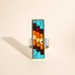Multicolored mosaic amber ring on a beige background