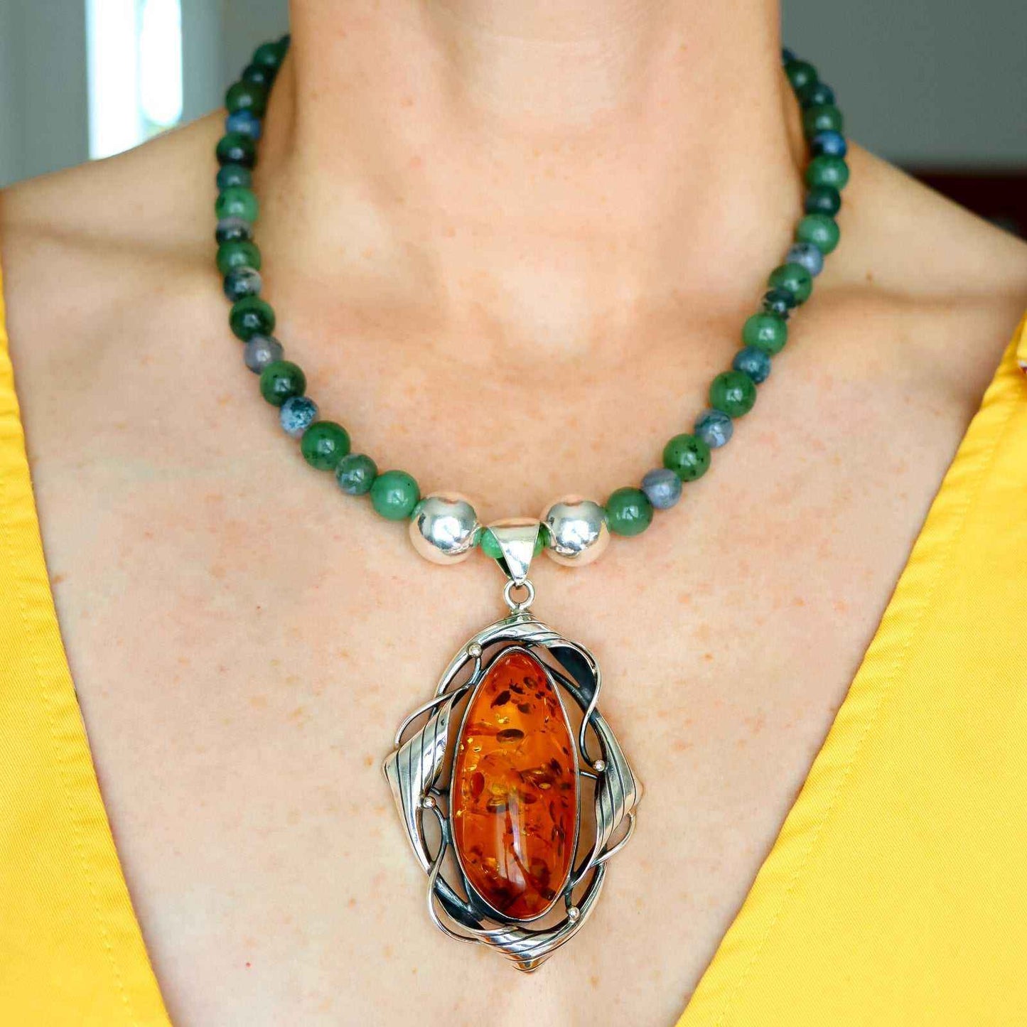 Cognac amber statement necklace with large amber pendant, green moss agate and Canadian jade beads, 925 sterling silver accents.