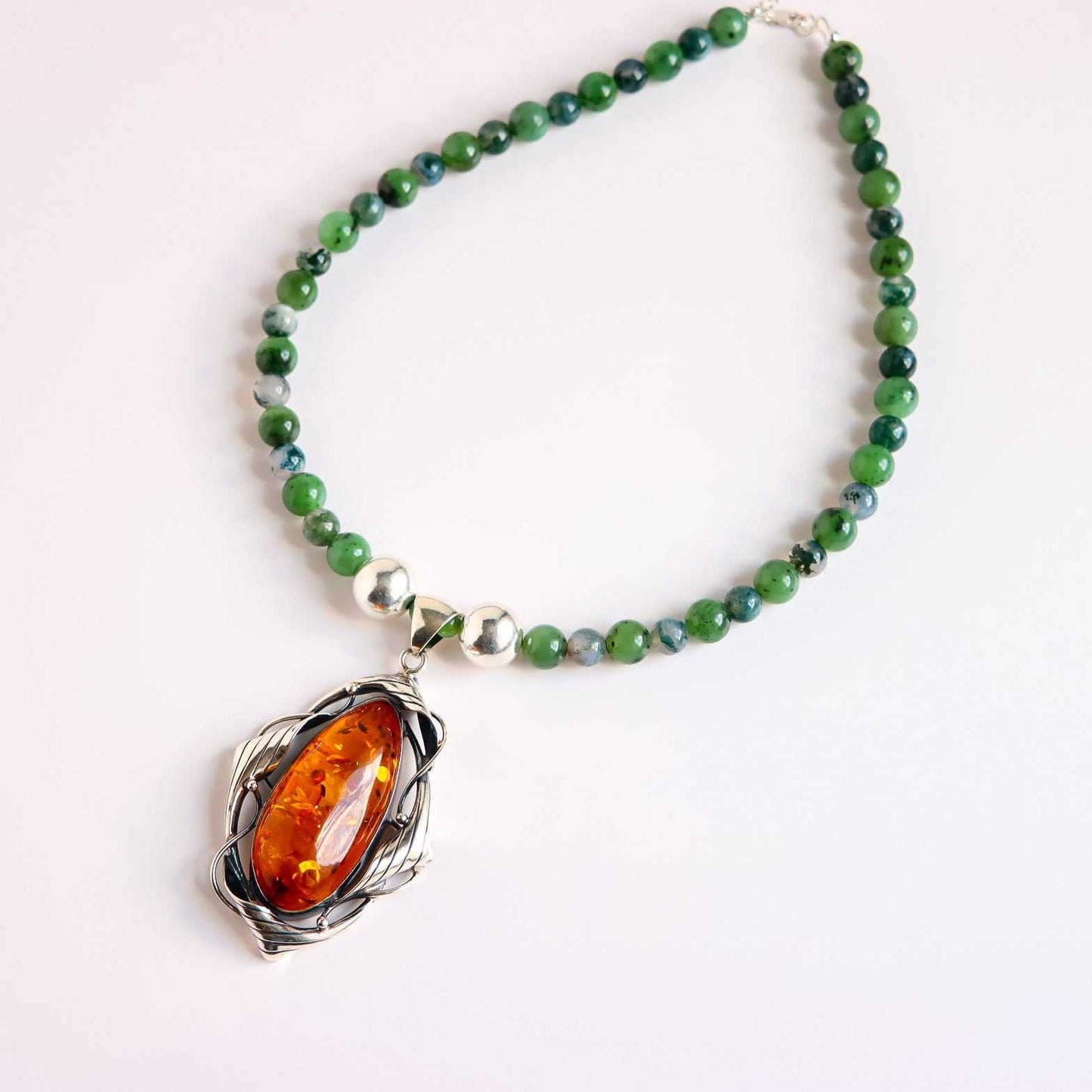 Cognac amber statement necklace with Baltic amber pendant, Canadian jade and green moss agate beads, set in sterling silver handcrafted jewelry