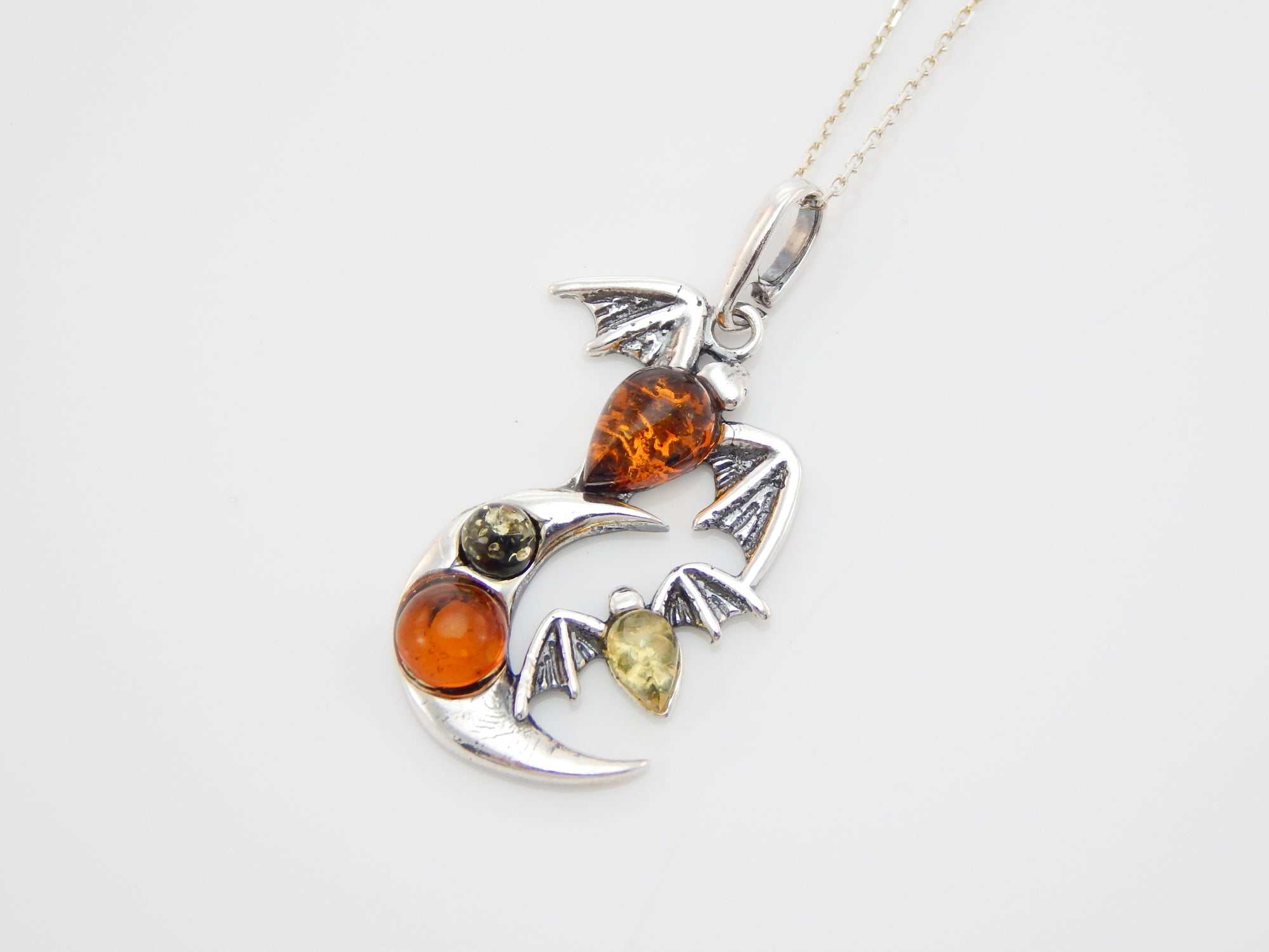 Natural Baltic Multicolor Moon and Bat Pendant Necklace