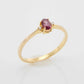 Genuine 14k Gold Garnet ring with diamonds in prong setting.