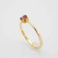 Genuine 14k gold ring with garnet and diamond in prong setting.