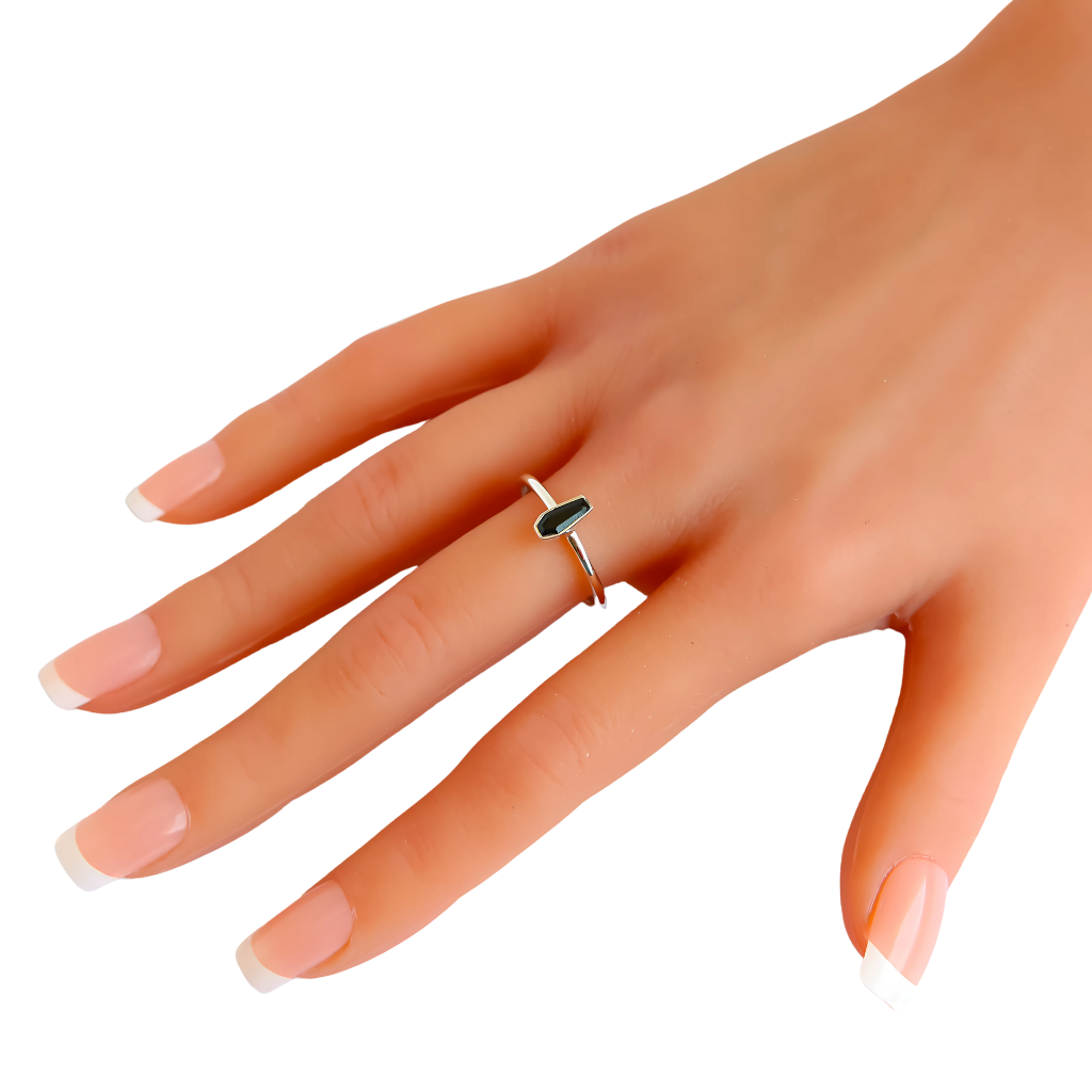 Side angle of black tourmaline coffin goth ring in sterling silver, showing band thickness and gemstone setting detail.