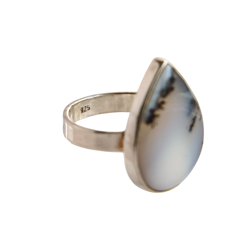 Dendritic Opal Ring in sterling silver with pear-shaped stone and black patterns.