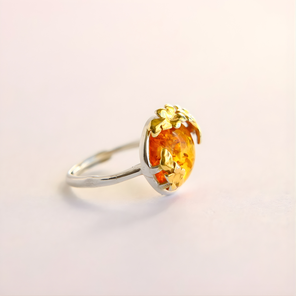 flower Ring with a yellow gemstone on a light pink background