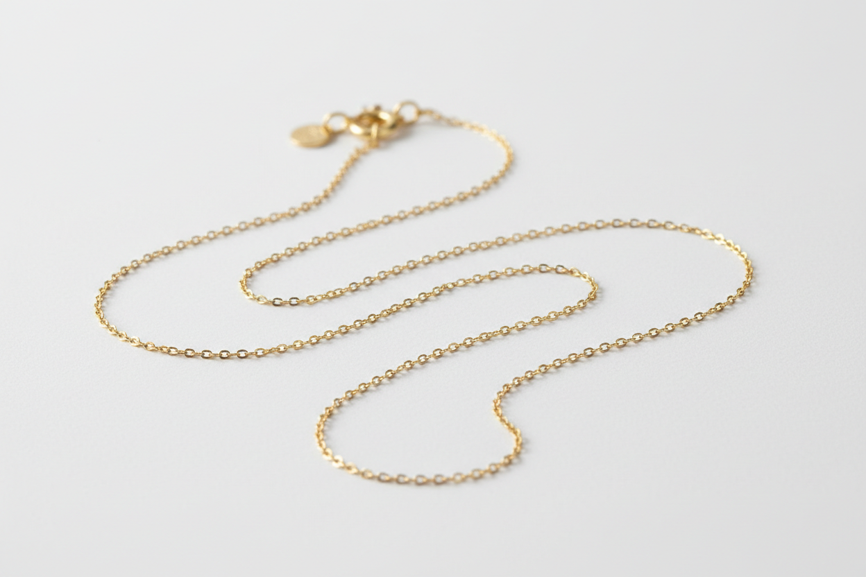 dainty cable chain necklace on neutral white background