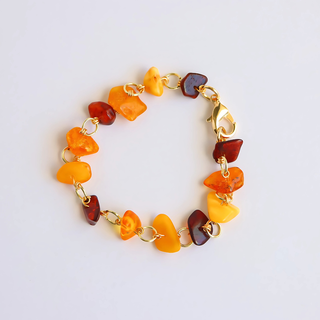 Handmade Baltic amber bracelet with butterscotch, cherry, and cognac stones on gold wire.