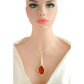 Baltic amber tulip pendant necklace with sterling silver and gold accents on mannequin.