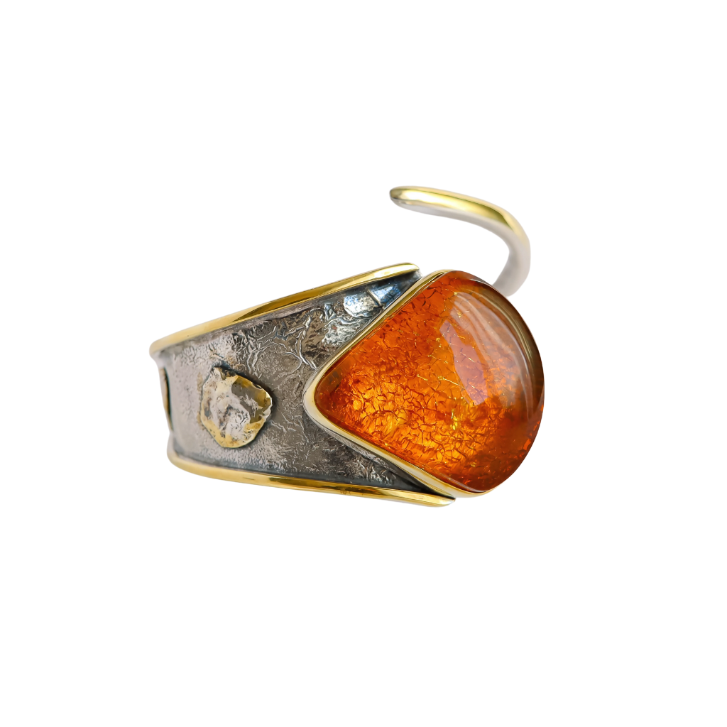 Handmade Baltic cognac amber cuff bracelet in 925 sterling silver and 14k gold plating.