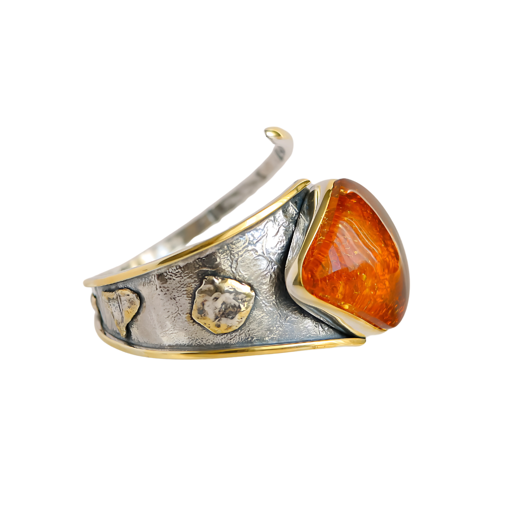 Handmade Baltic cognac amber cuff bracelet in 925 sterling silver with gold plating.