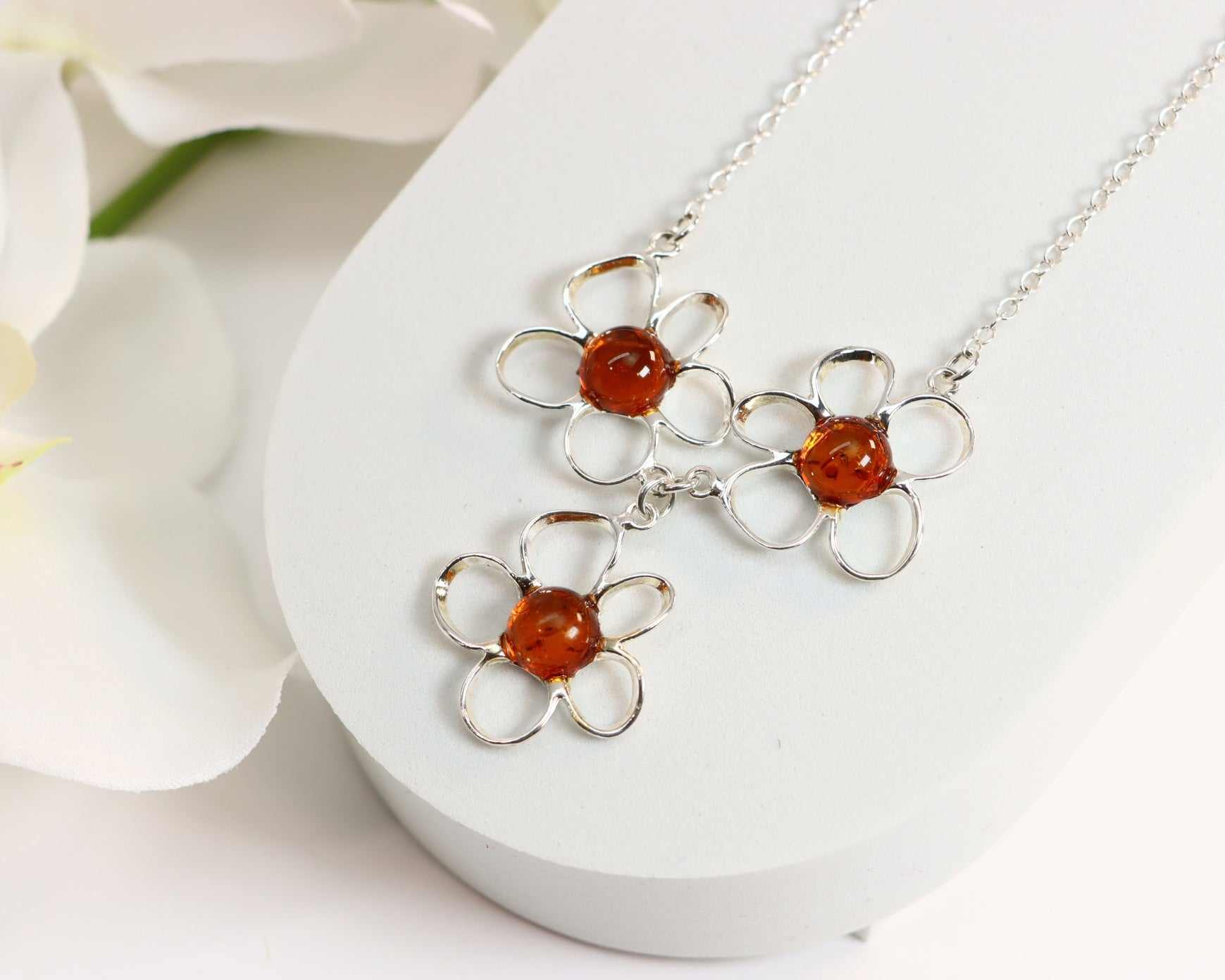 Natural Baltic Cognac Amber Flower Child Necklace in 925 Sterling Silver