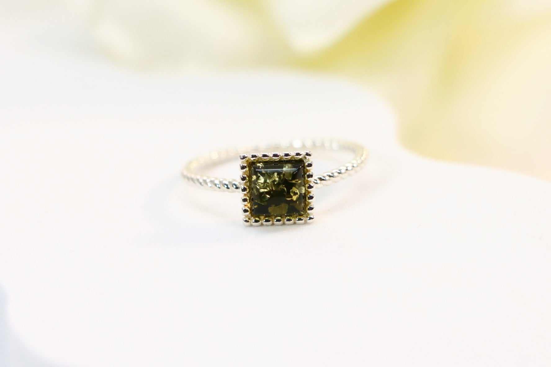 green amber ring