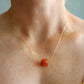 Minimalist amber pendant necklace with genuine Baltic Lithuanian amber on a delicate 14k gold filled chain worn on neck