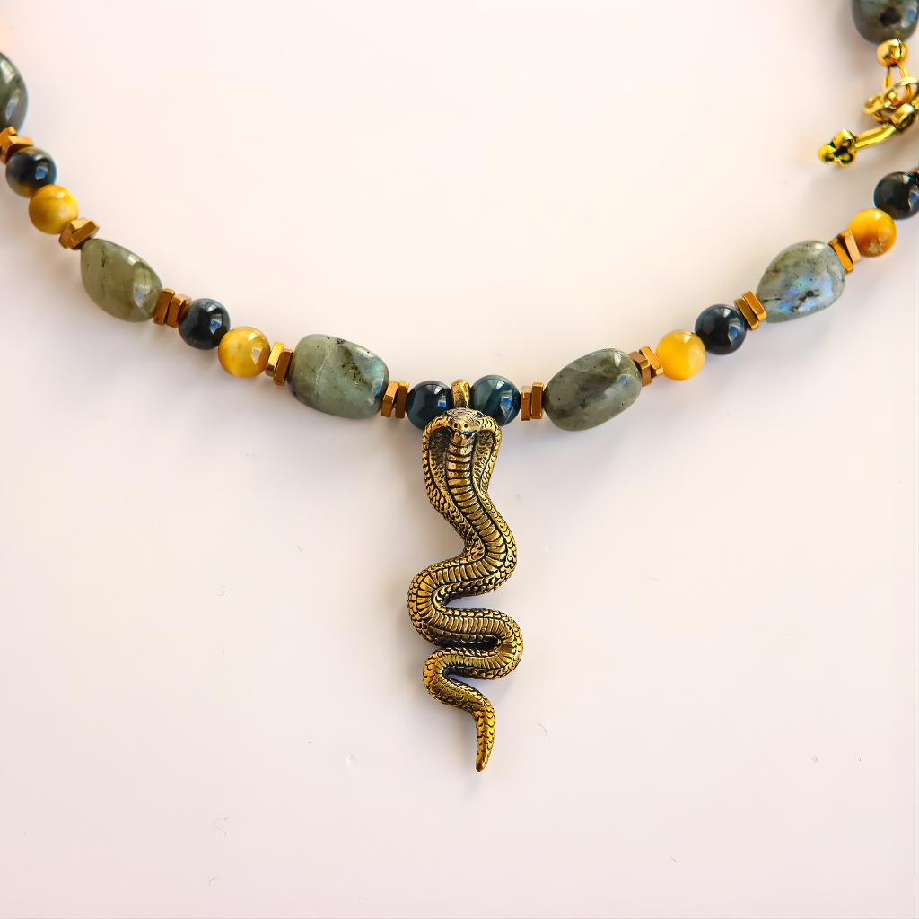 Beaded Necklace with snake pendant  on a white background