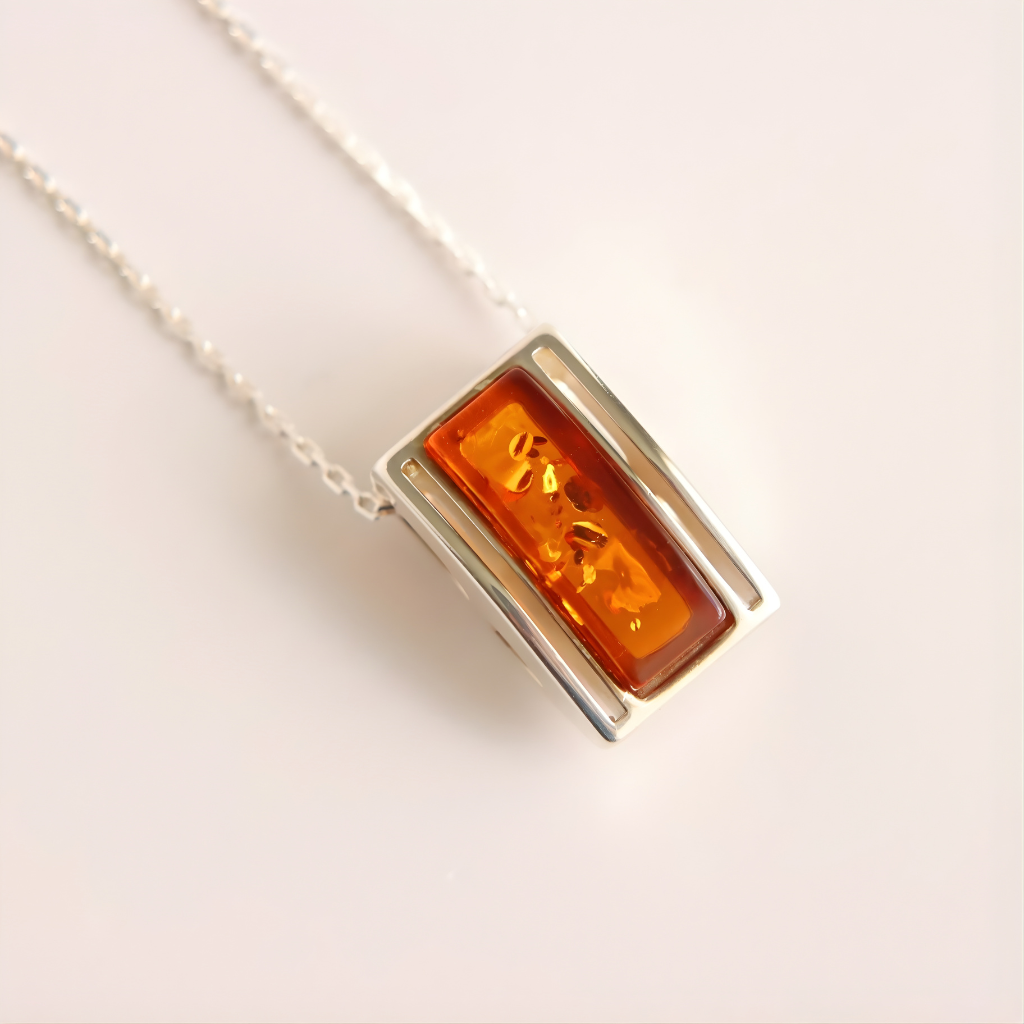 amber Necklace with a rectangular amber pendant on a white background