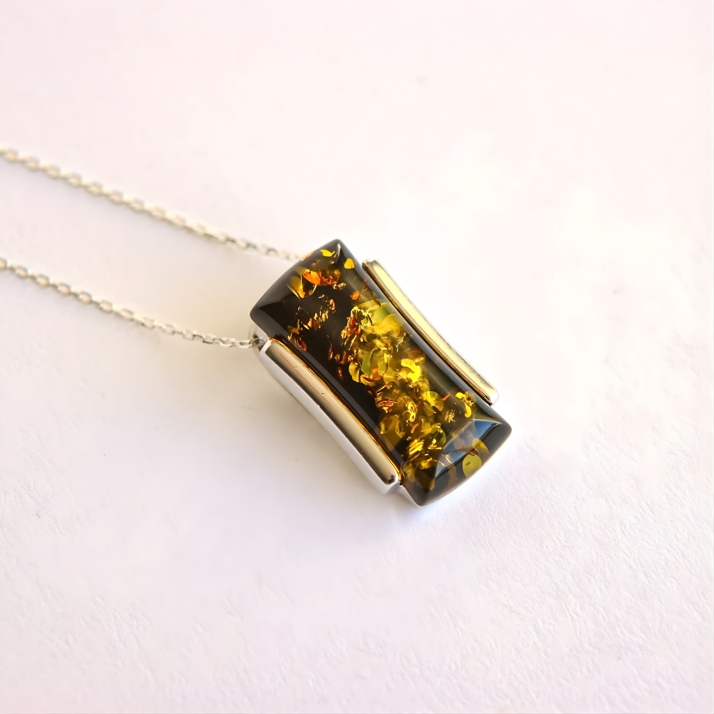 amber Necklace with a rectangular green amber pendant on a white background